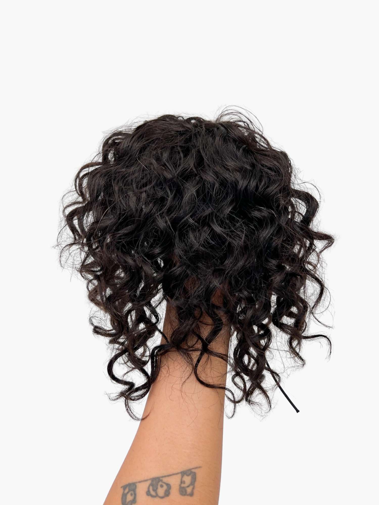 Curly clip-in bun product