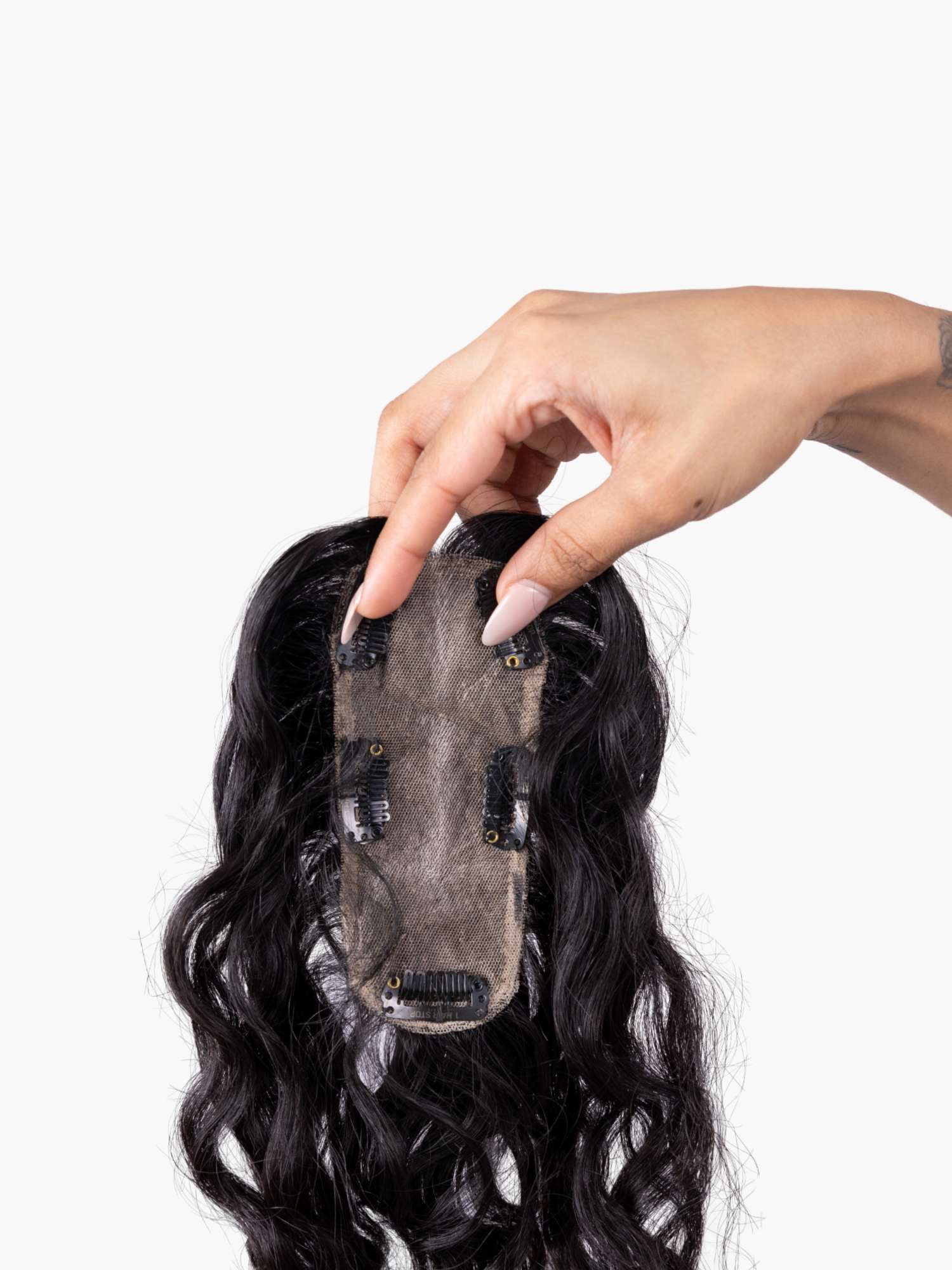 back view of curly hair topper