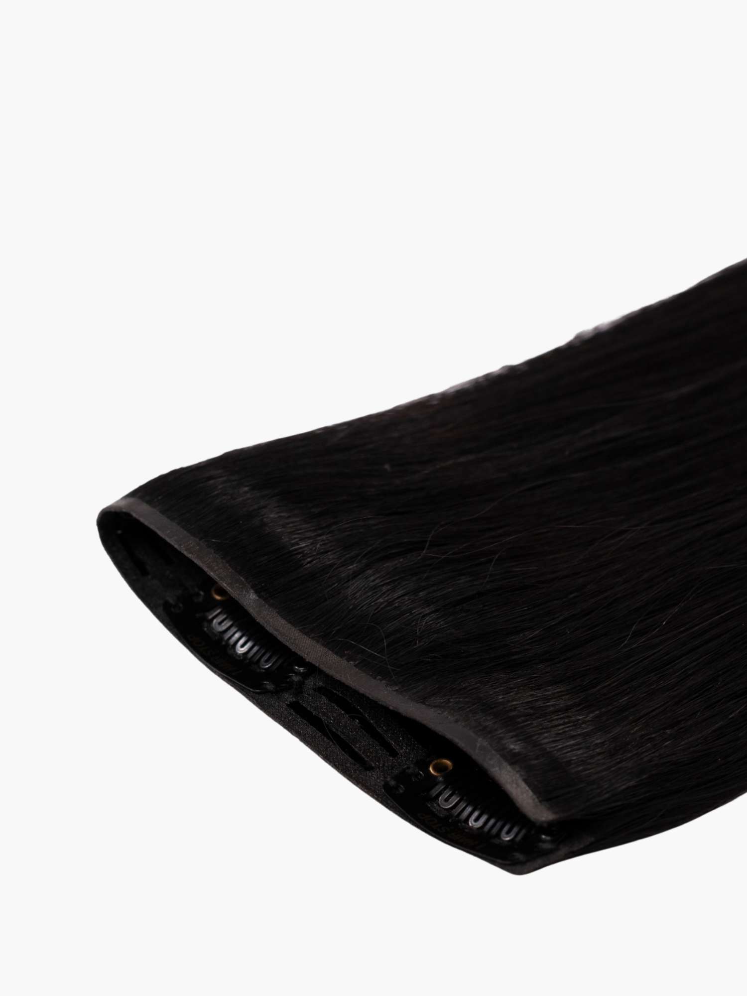 Seamless1 clip outlet in hair extensions